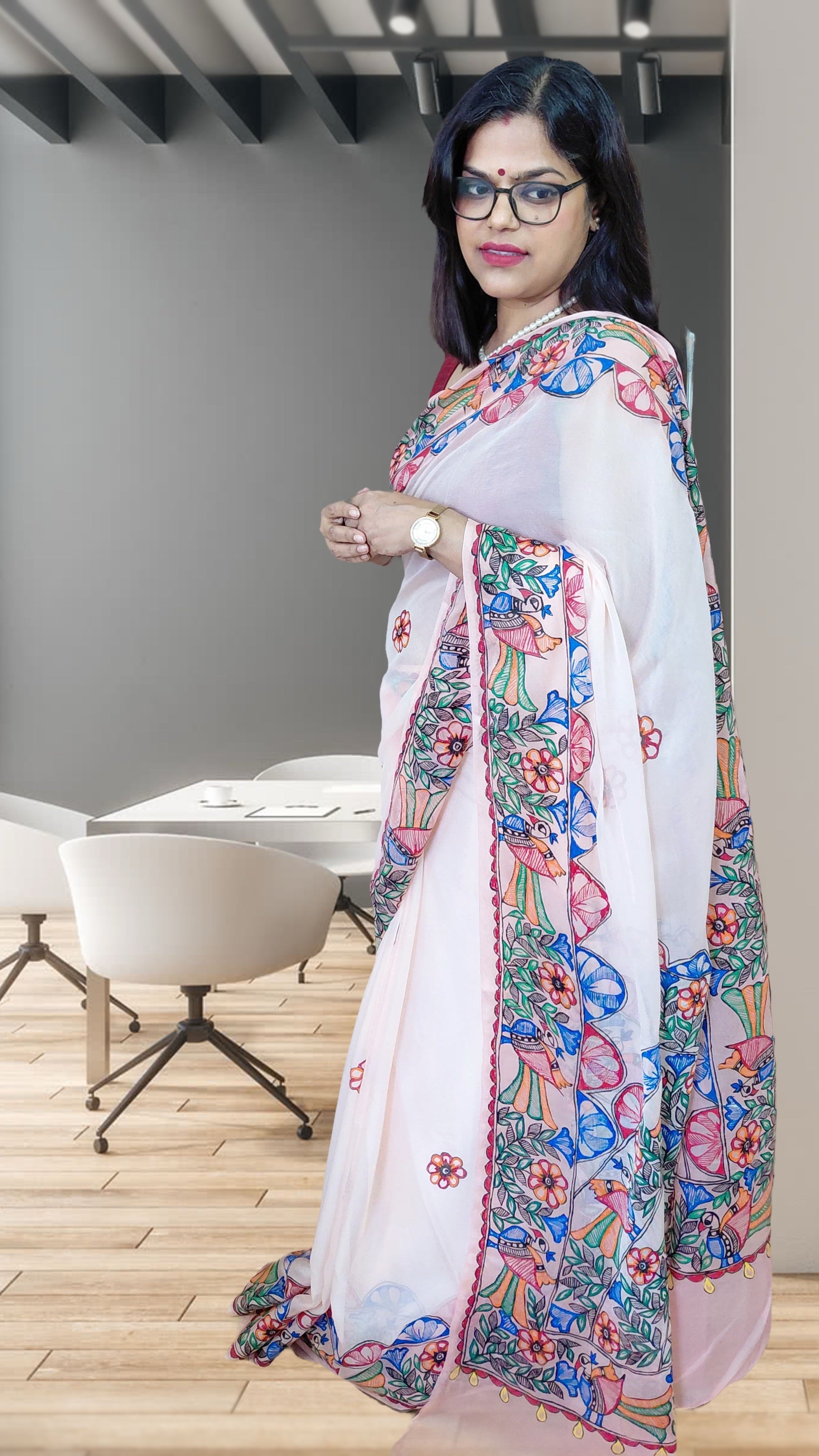 Full-length blush pink Pure Chiffon Madhubani saree with floral motifs