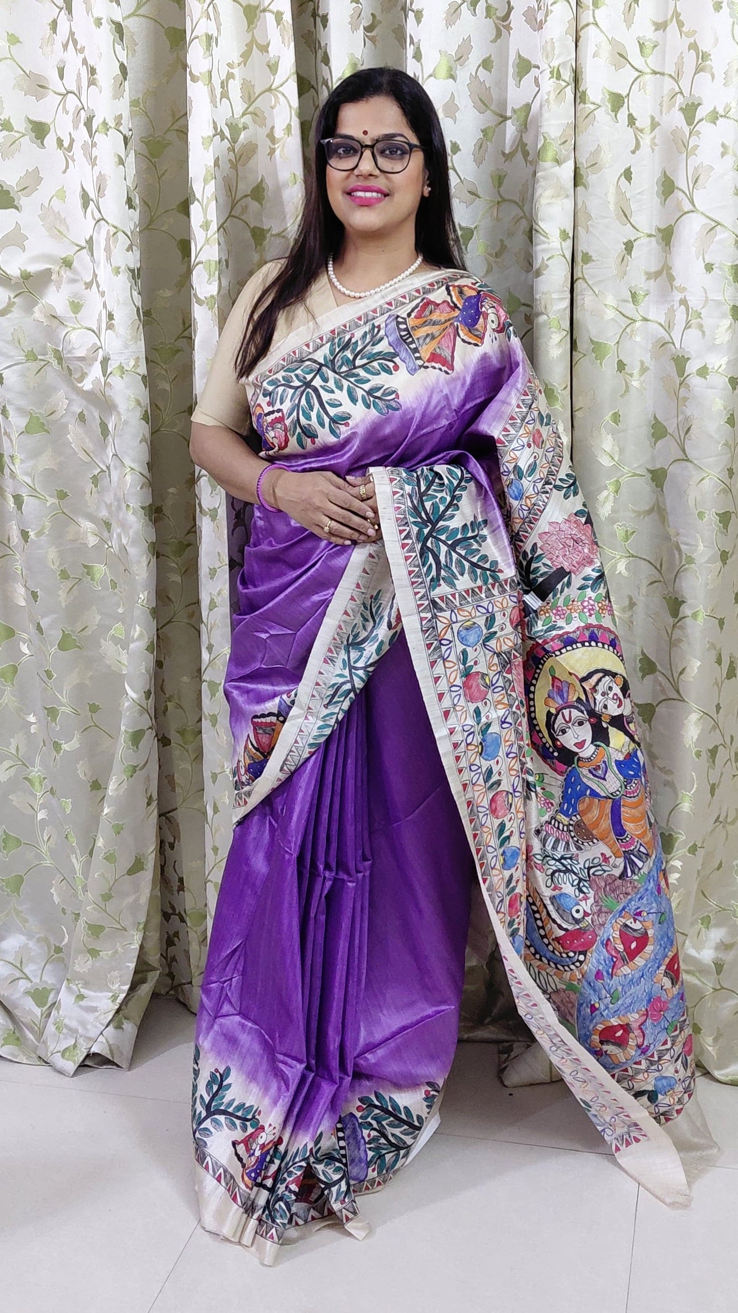 Hand-painted Madhubani saree with Radha Krishna swing theme