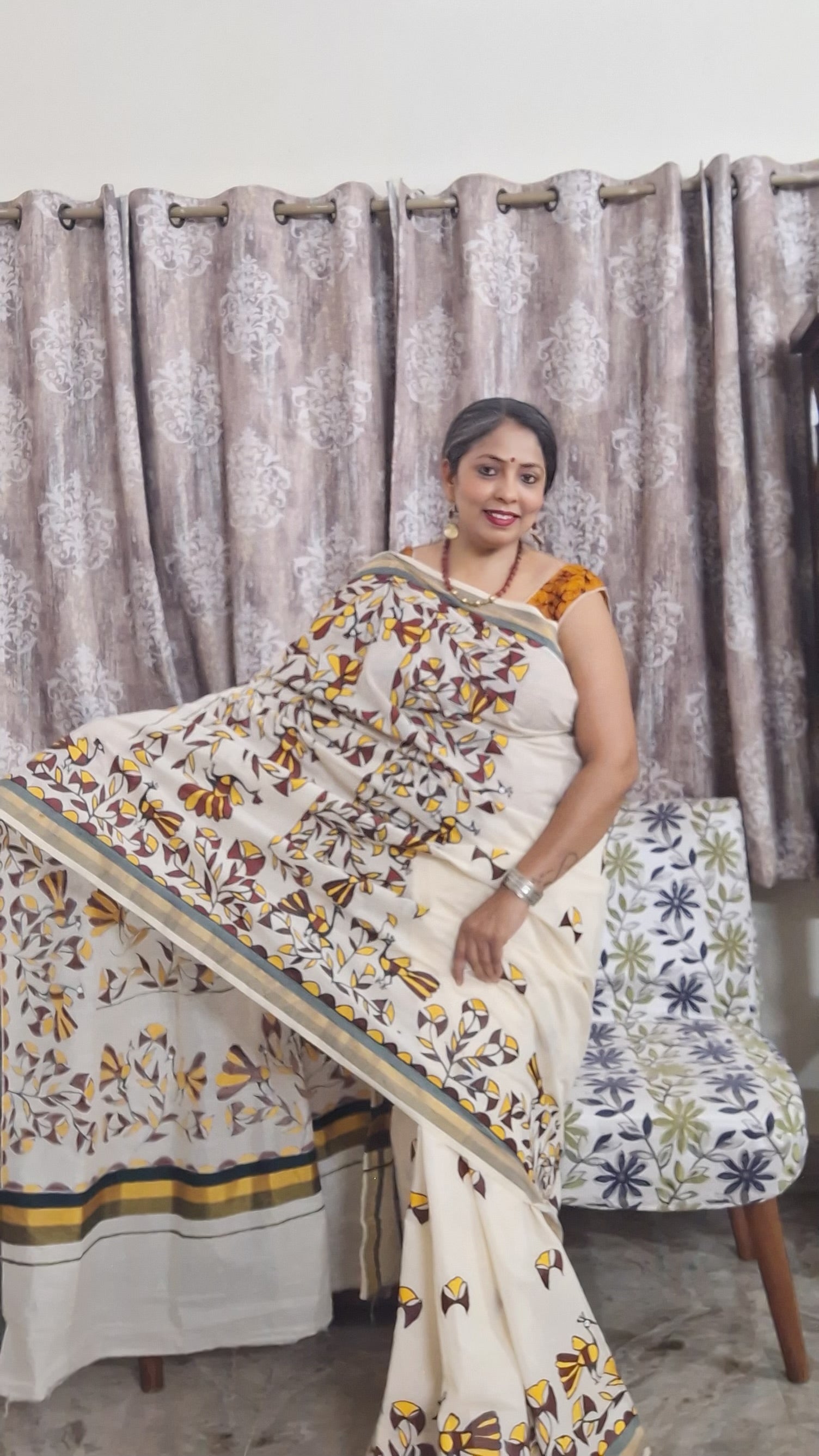 Hand painted Sohrai art Kerala cotton saree with tribal bird motifs