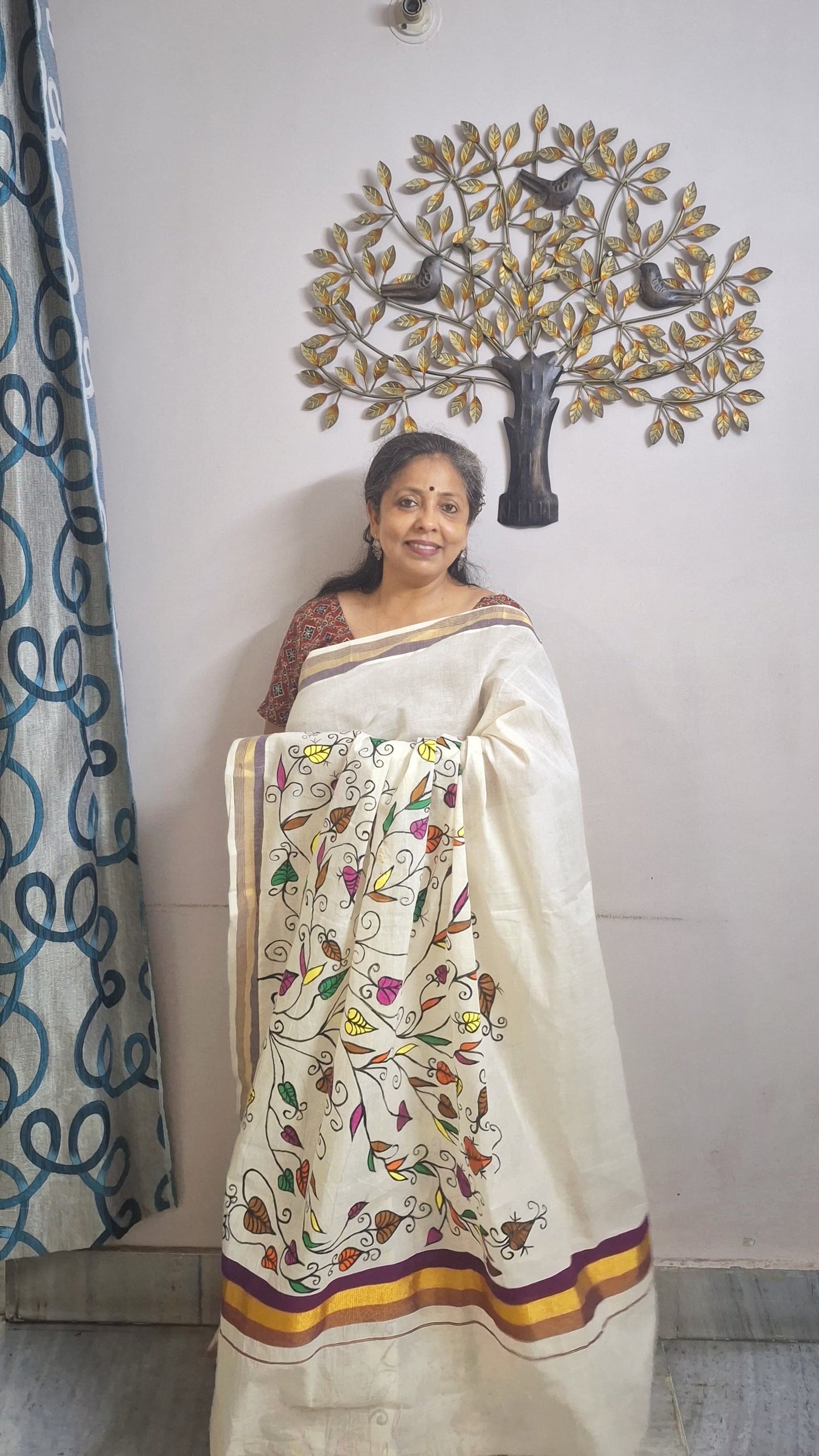 Heritage hand painted sohrai saree with colourful botanical motifs