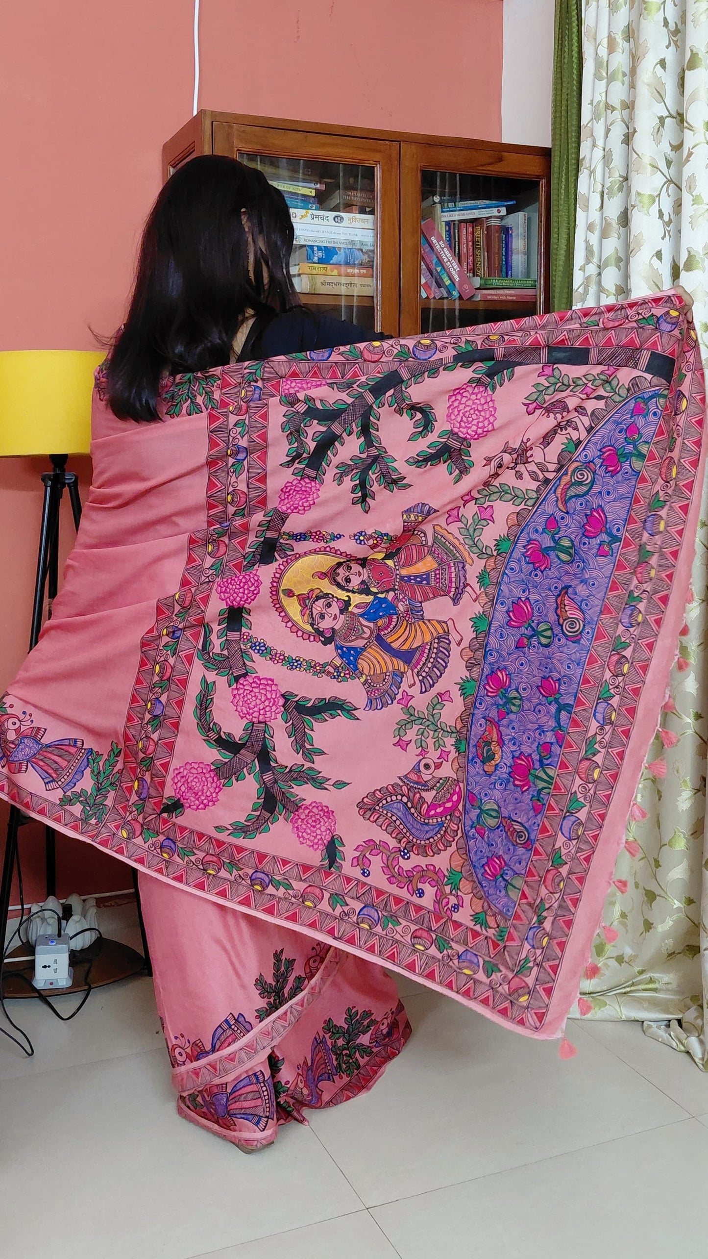 Back view of hand painted Madhubani saree with artistic pallu detail display
