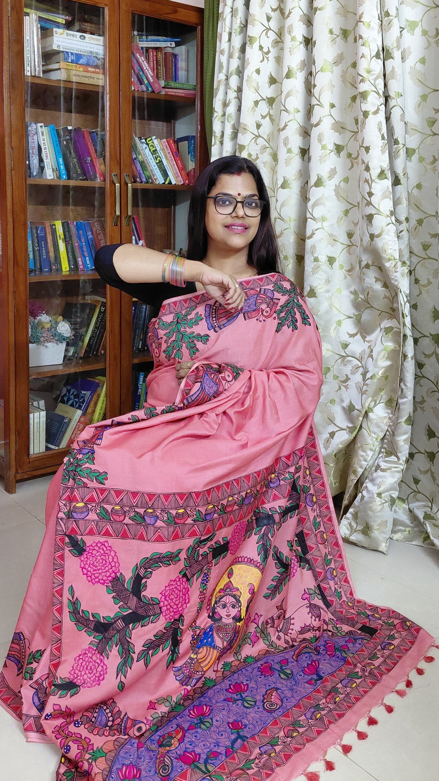 Luxury pink silk saree featuring authentic Madhubani folk art