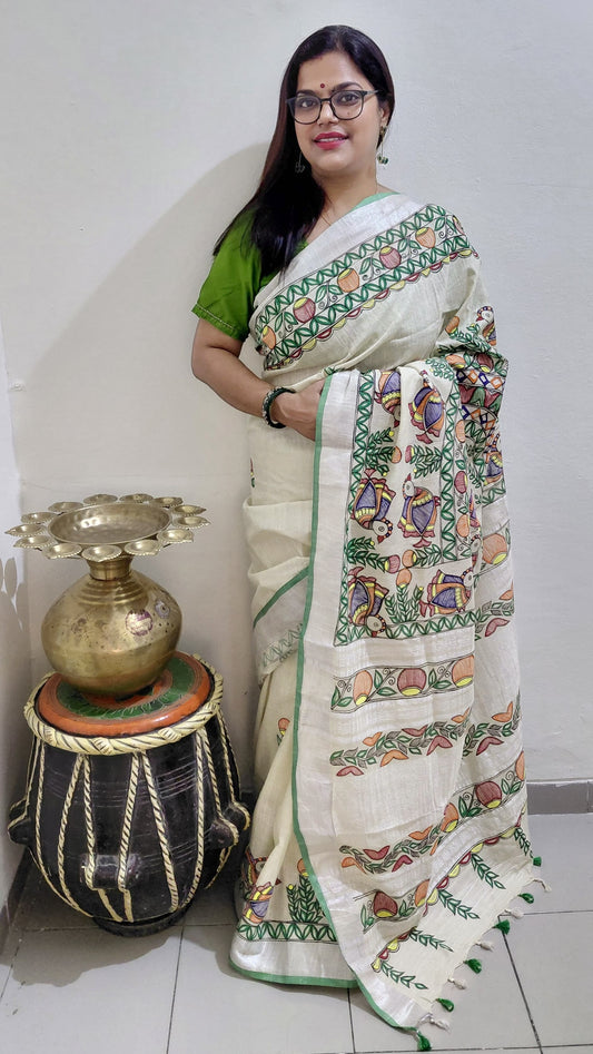 Ivory linen Madhubani saree with Mithila bird motifs and green blouse