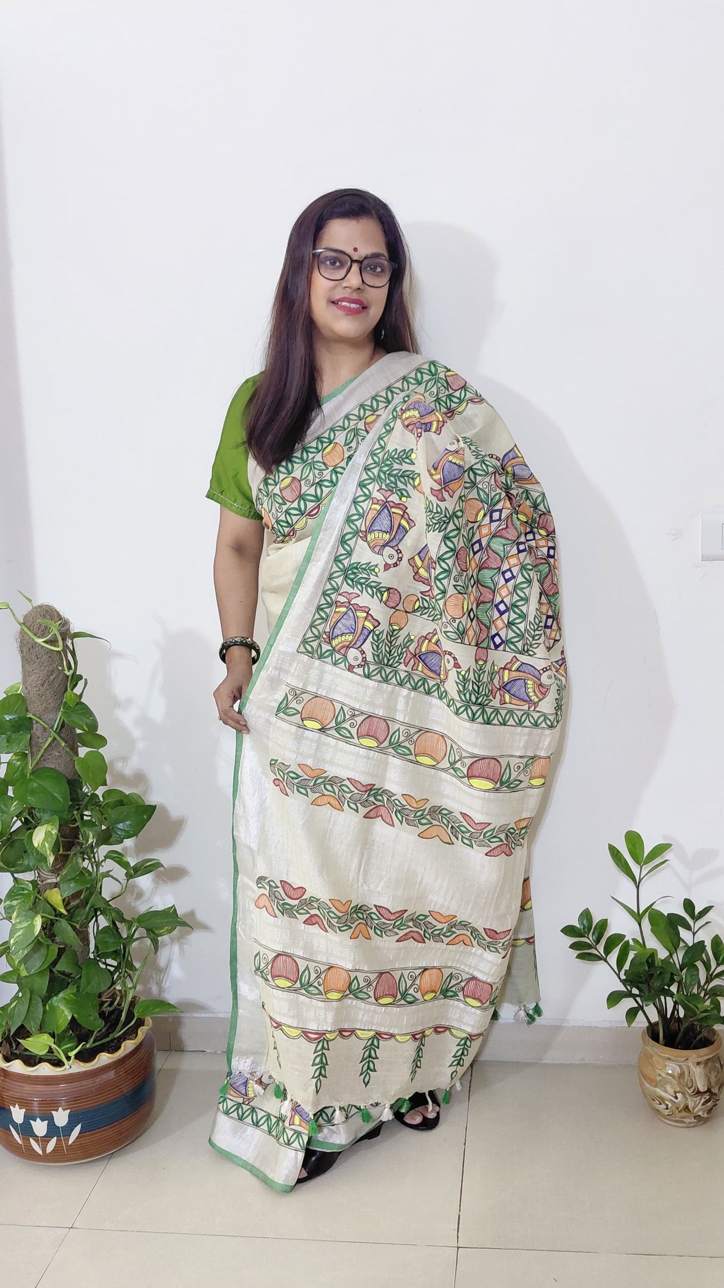 Madhubani painting Full saree display with floral borders and green edging