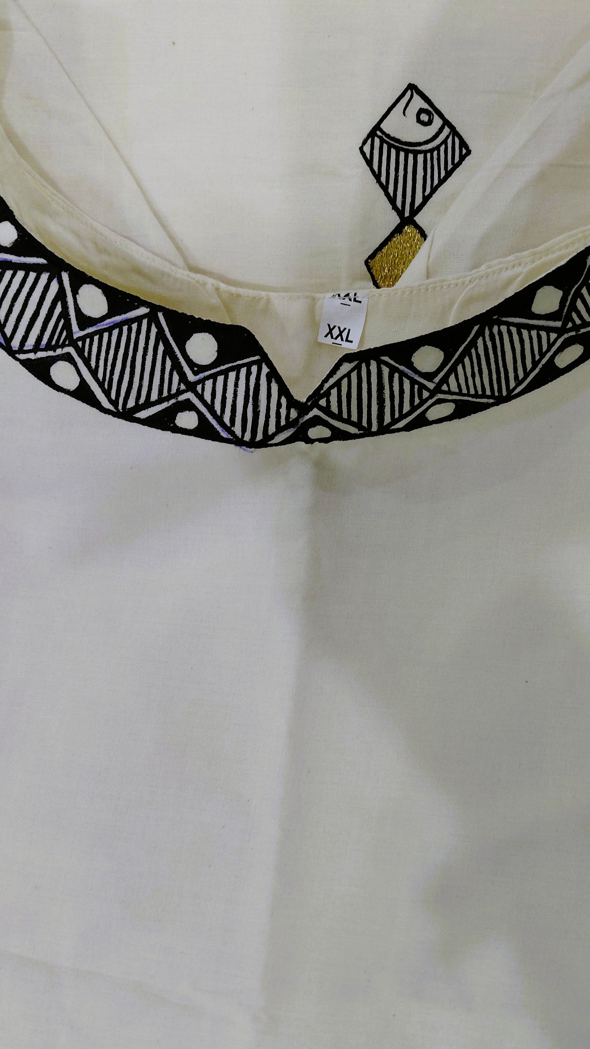 Hand-painted black and white folk neckline artwork on kurta