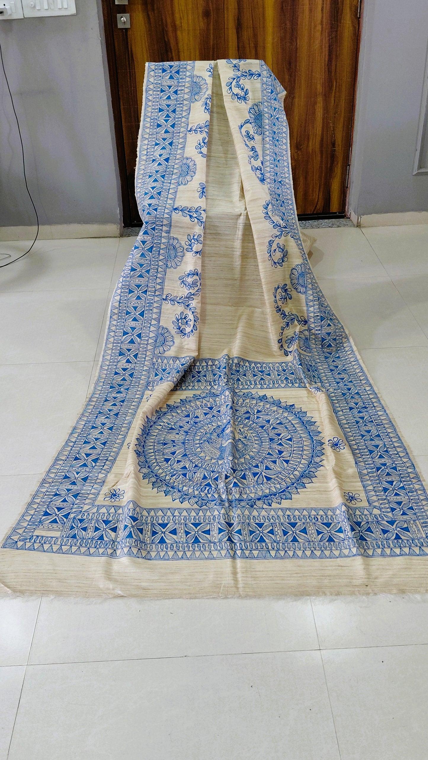 Natural Tussar Ghicha Silk Saree with Monochrome Blue Madhubani Hand Painting