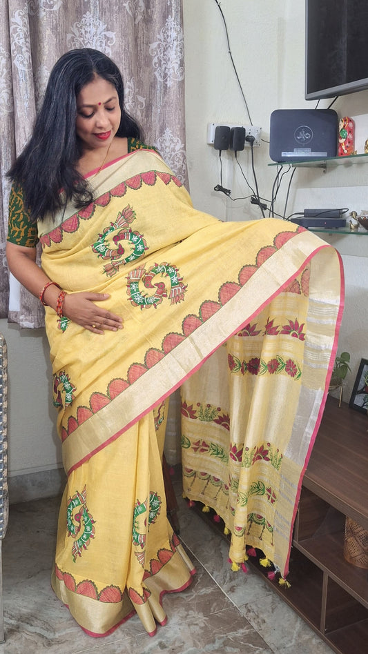 Draped pallu showcasing floral border Madhubani artwork