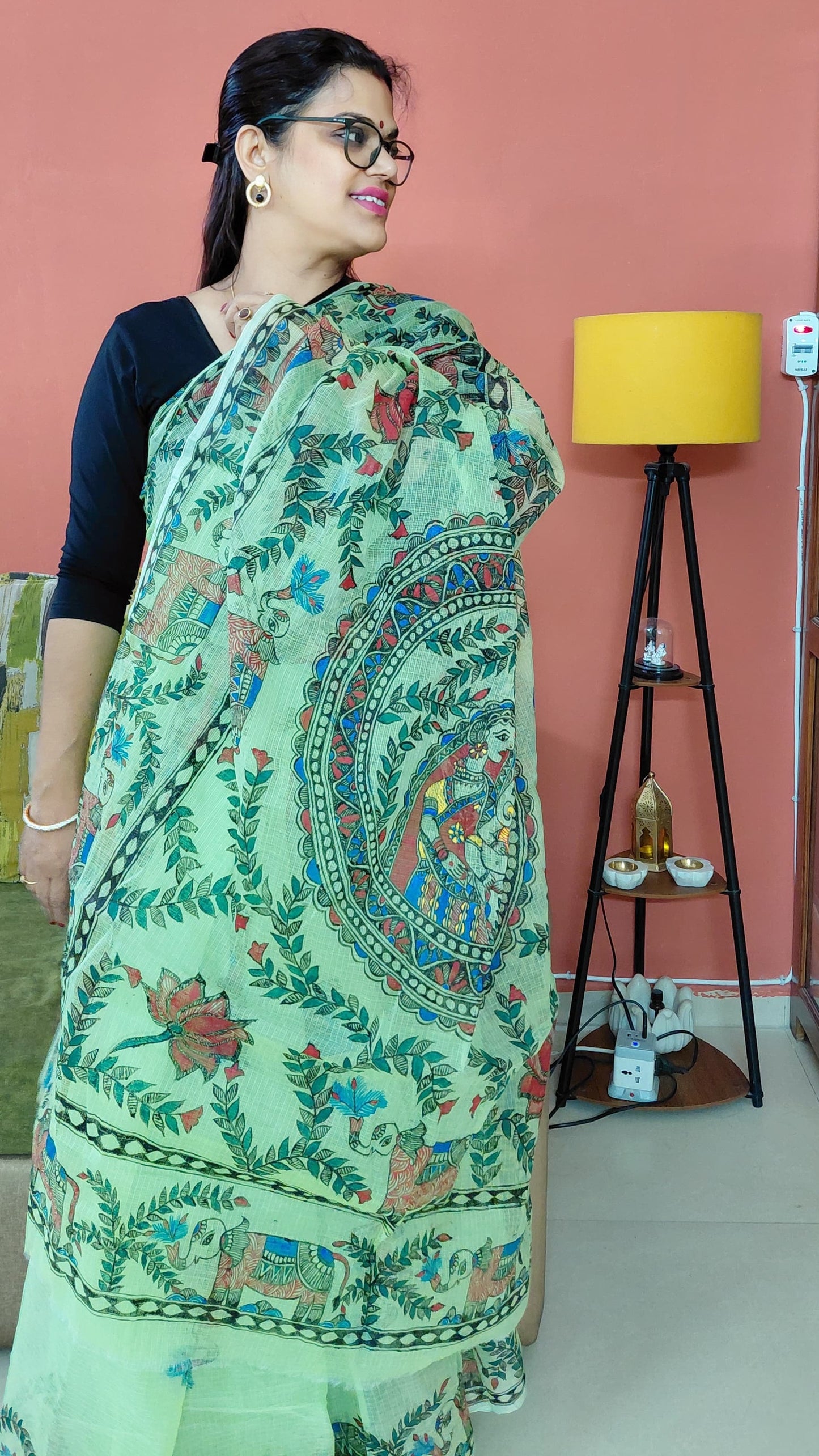 Pastel green Kota Doria saree with Madhubani artwork