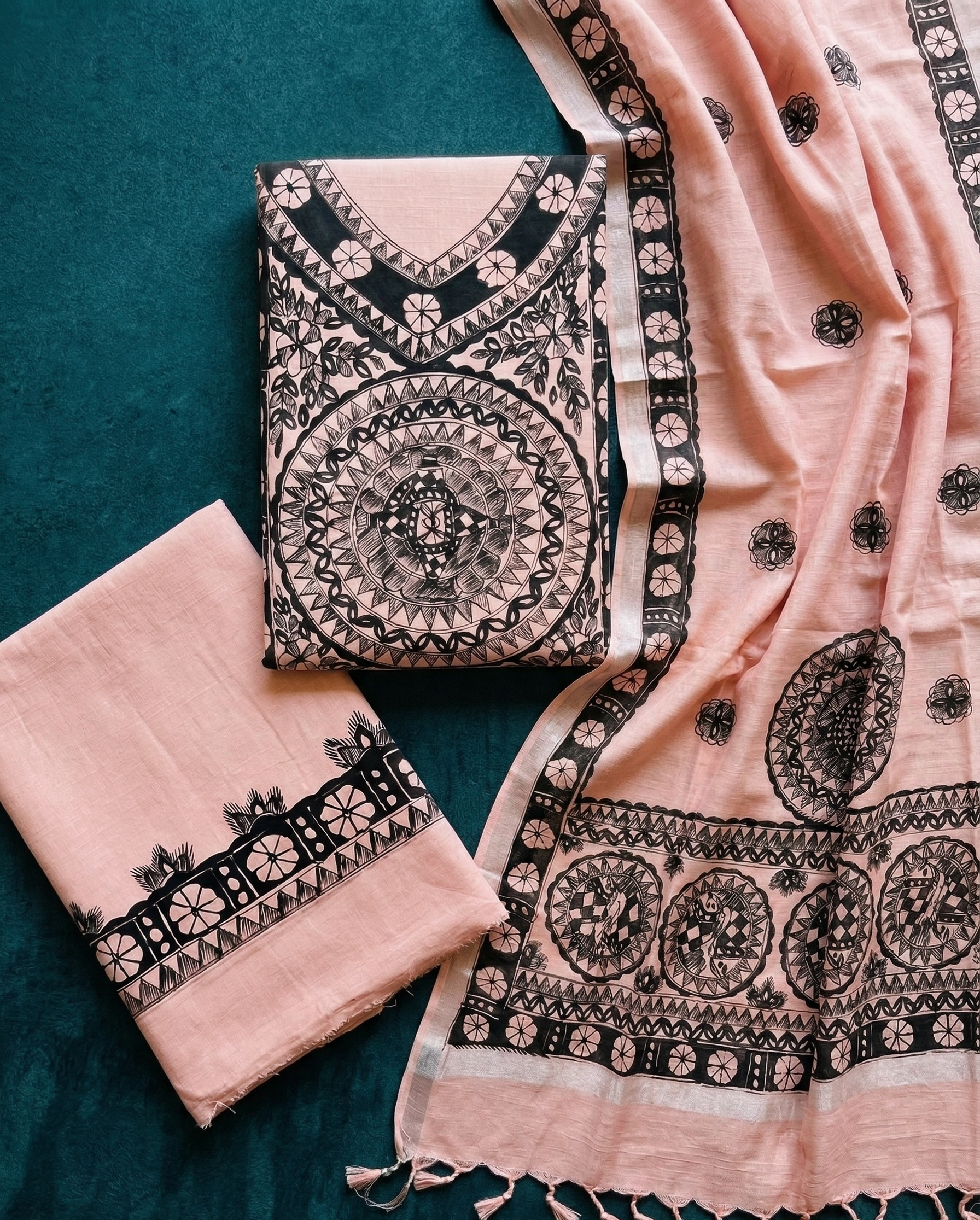 Blush pink Madhubani cotton suit set flat lay showing kurta dupatta and bottom