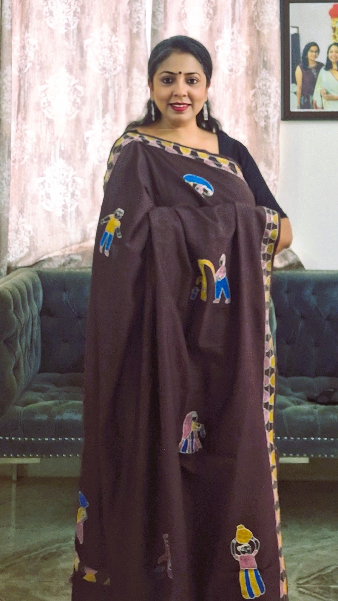 Coffee brown Sujni embroidery saree showing handcrafted village life scenes