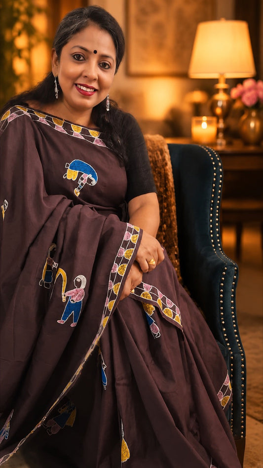 Sujni embroidered village life Katan silk saree in deep coffee brown displayed by model