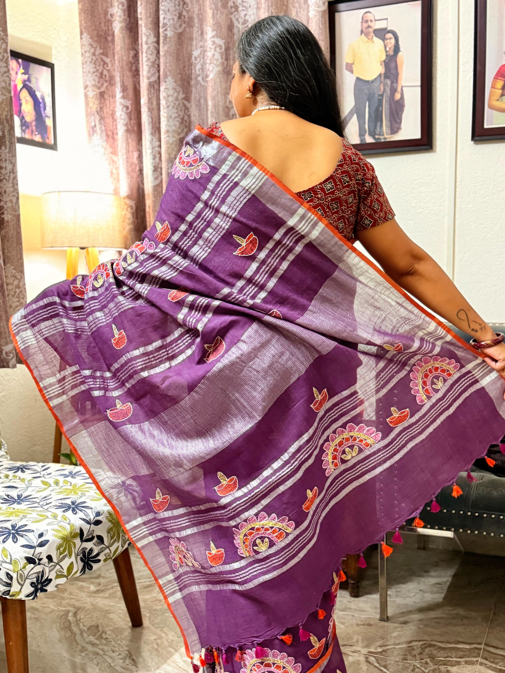 Back view of Sujni embroidered linen saree showing detailed pallu work