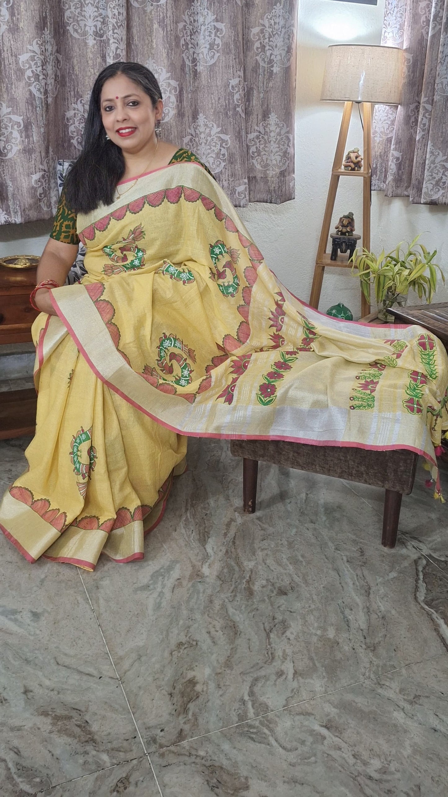 Madhubani Linen hand painted Saree, Seated pose highlighting saree fall and linen texture